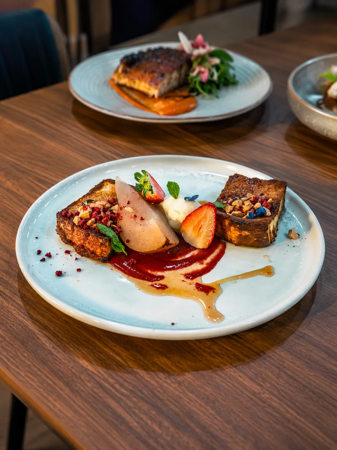 Honey Butter French Toast with pear, berries and maple sauce at Cafe Nineteen