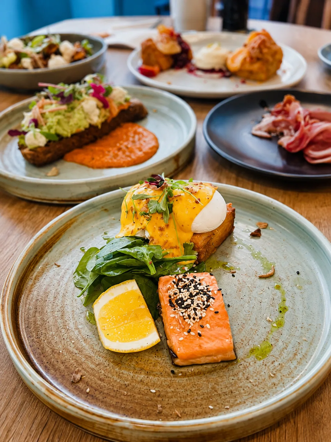 Salmon breakfast plate with eggs and greens